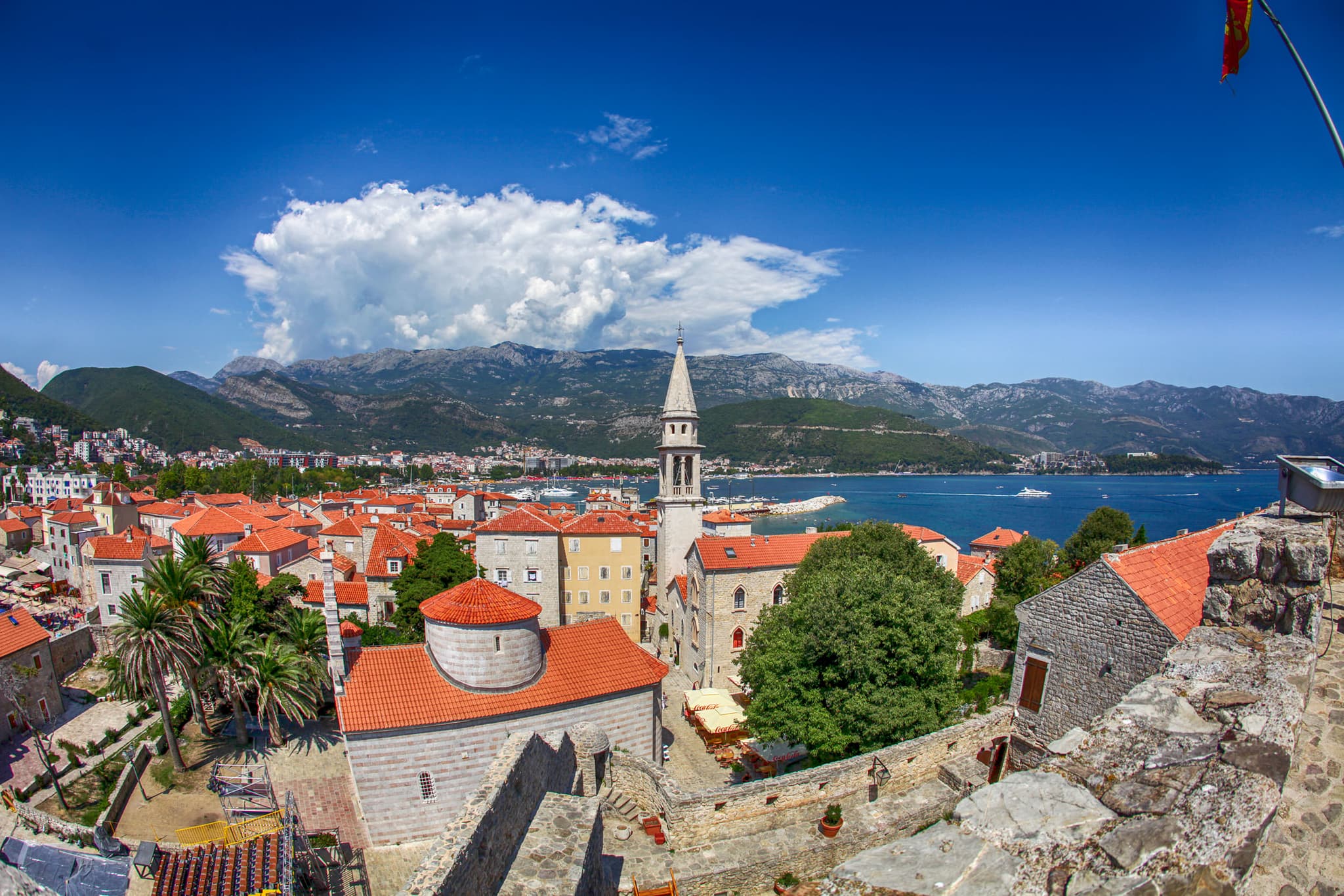 Budva old town rooftops with mountains and Adriatic Sea