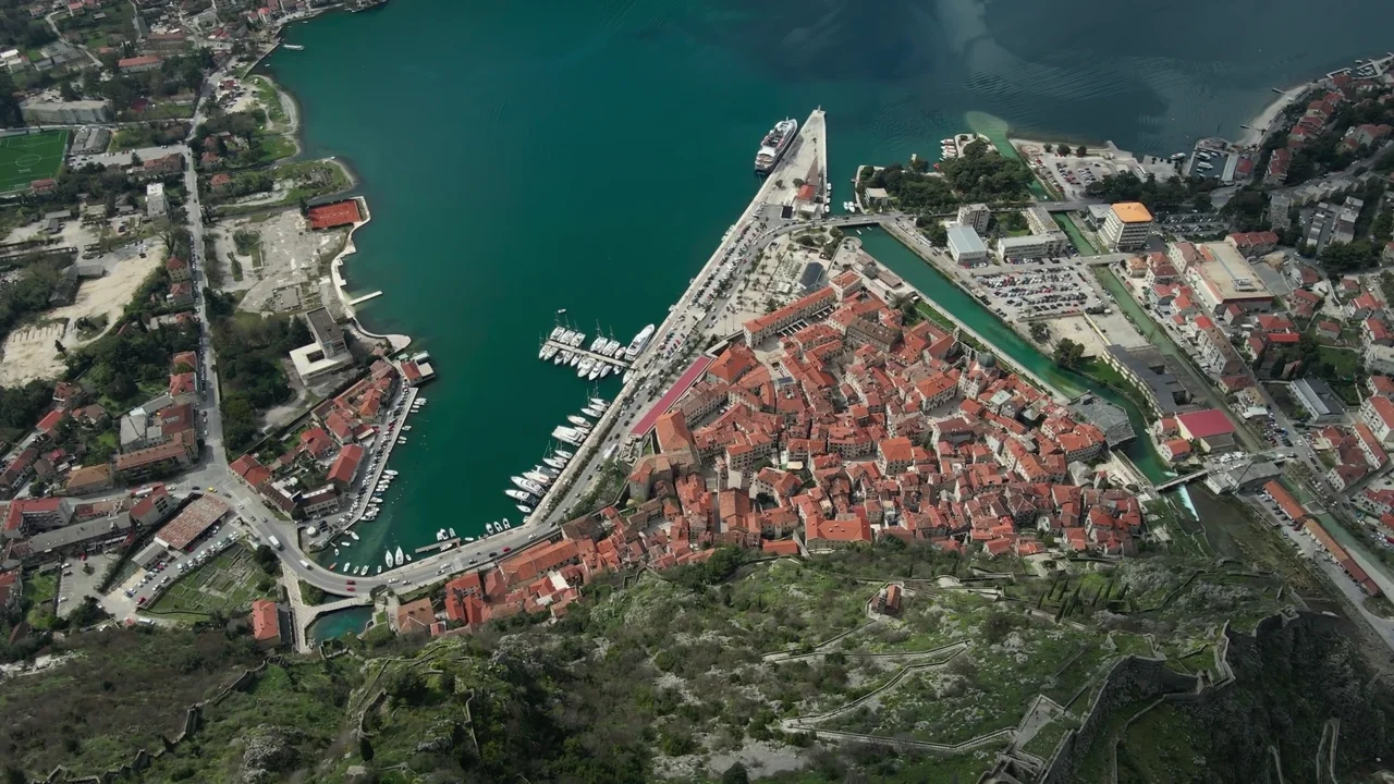 Narrow cobblestone streets in a Montenegrin old town with stone buildings