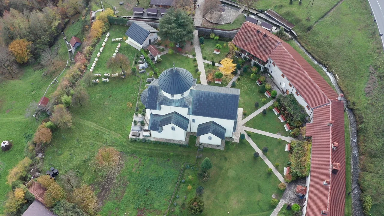 Traditional Montenegrin stone house with terracotta roof tiles